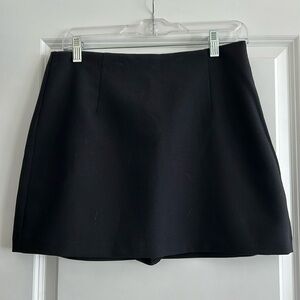 Black mini skirt with shorts underneath